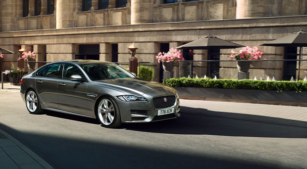 2020-Jaguar-XF-dark-gray-street-front-side-view